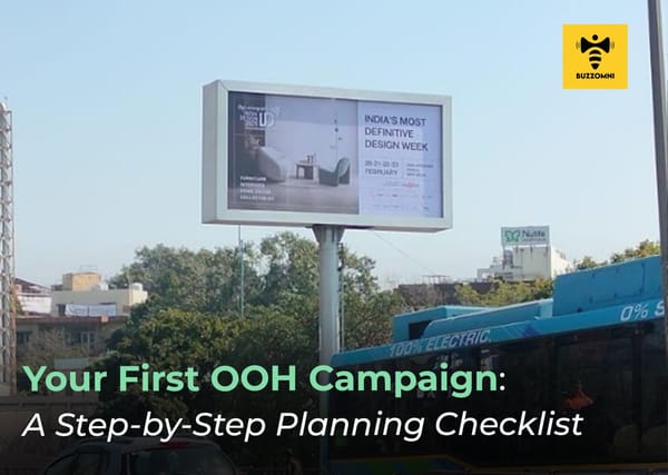Buzzomni billboard advertisement showcasing out-of-home marketing in a busy city.